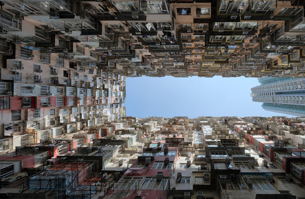 Your First Month in Hong Kong in the Order That Works: Monster Building courtyard upward view Quarry Bay Hong Kong dllu